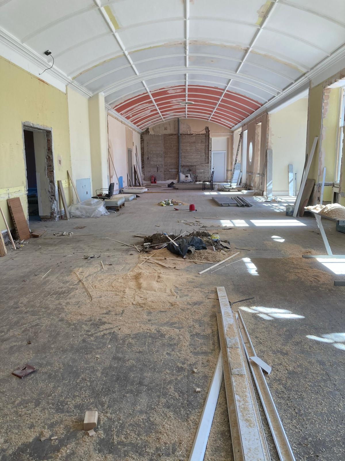 Crichton Hall floor revealed after old floor coverings were removed. Heritage oak floorboards revealed.